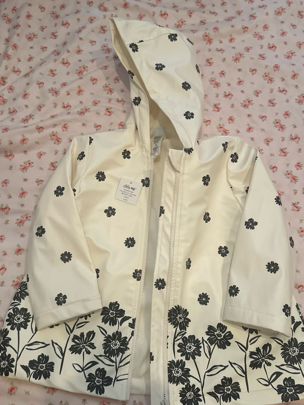 Little Me Cream Hooded Raincoat with Black Floral Print